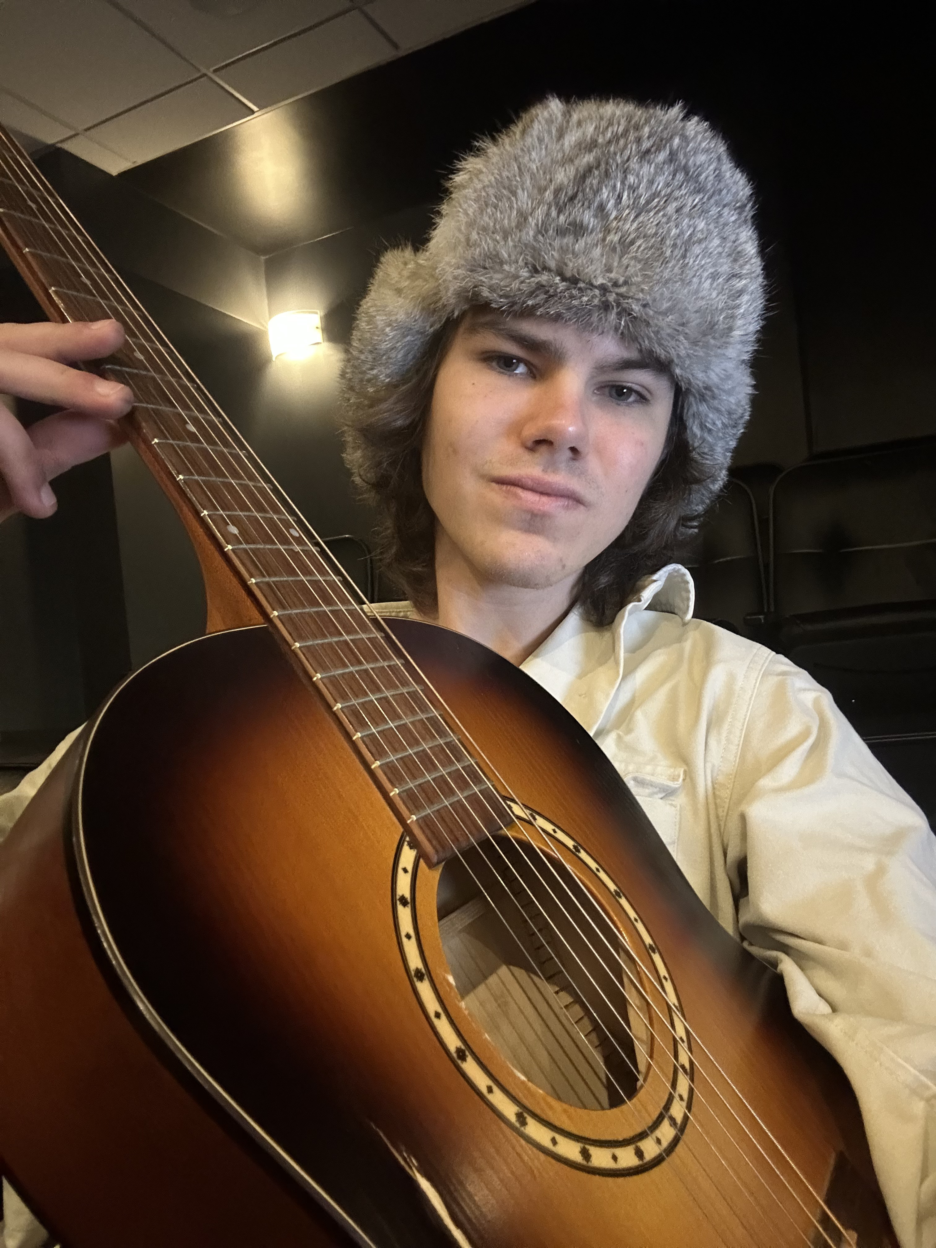 Photo of me playing guitar